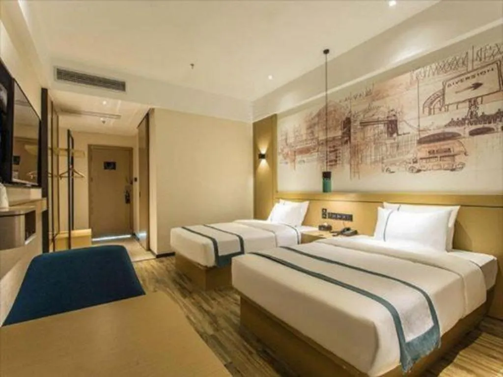 Bed in City Comfort Inn Liuzhou Liucheng