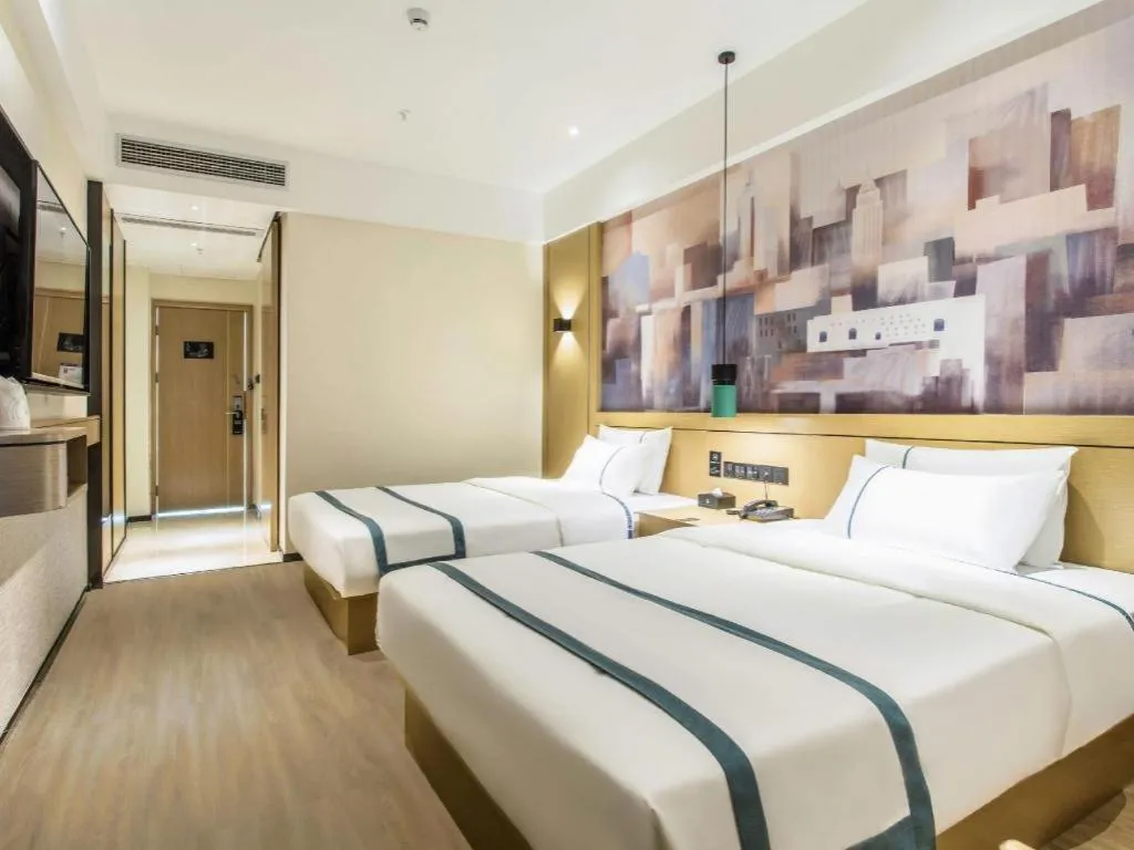 Bed in City Comfort Inn Liuzhou Liucheng