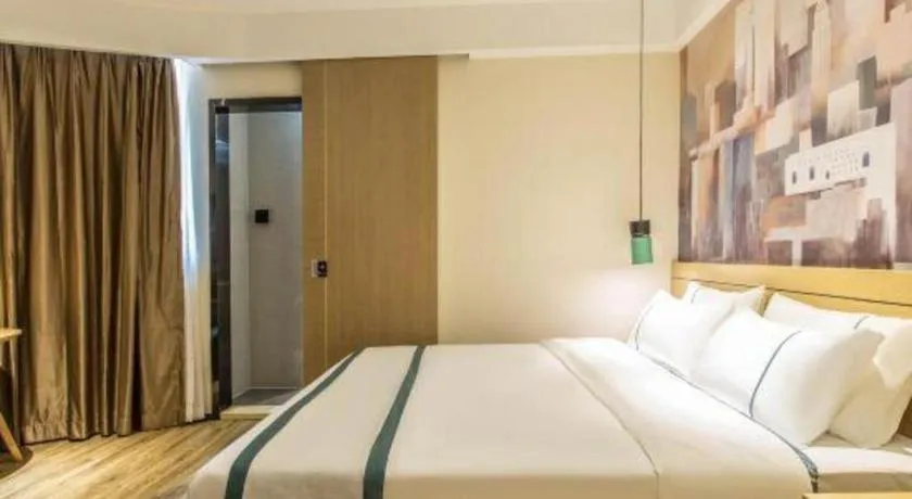 Bed in City Comfort Inn Liuzhou Liucheng