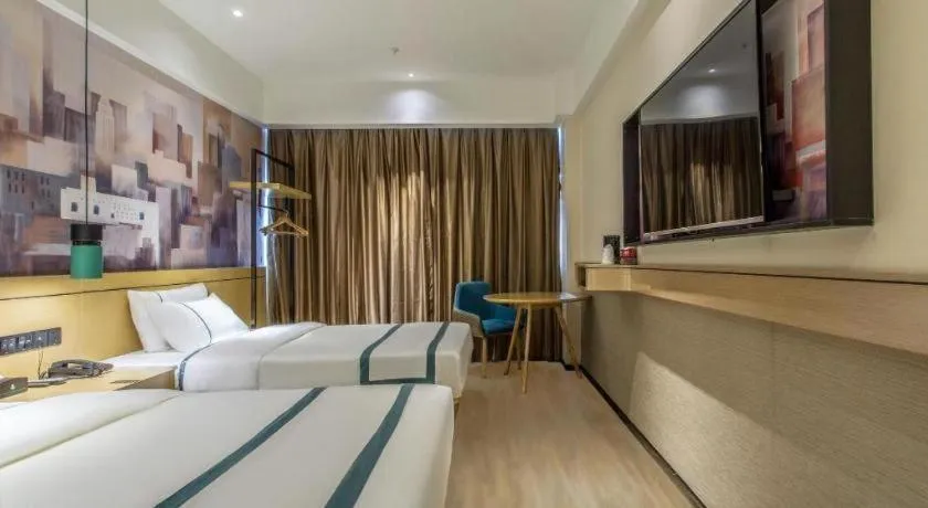 Bed in City Comfort Inn Liuzhou Liucheng