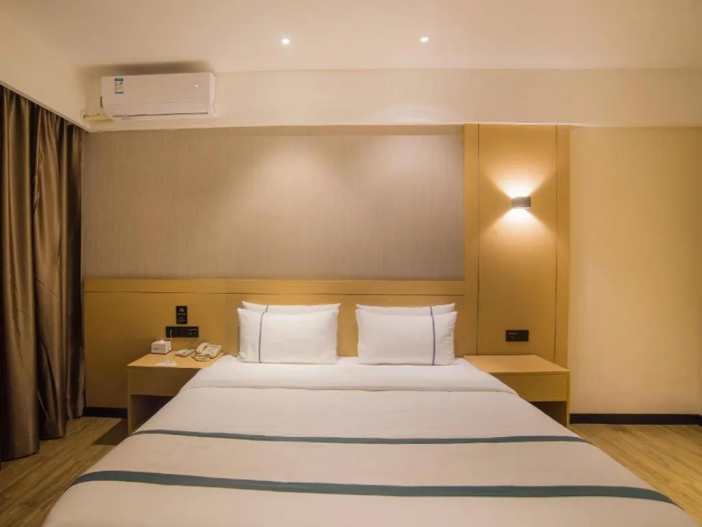 Bed in City Comfort Inn Liuzhou Longtan Park Ma'anshan Baiyun