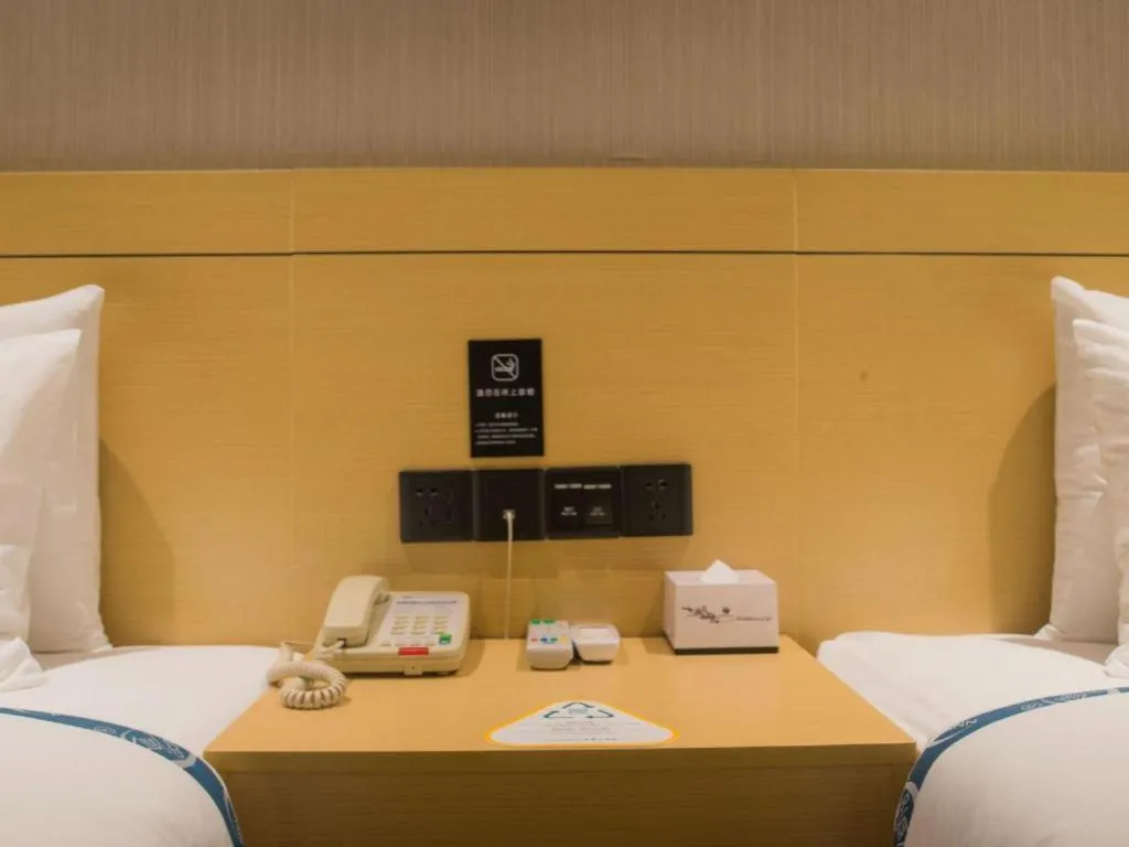 Bed in City Comfort Inn Liuzhou Longtan Park Ma'anshan Baiyun