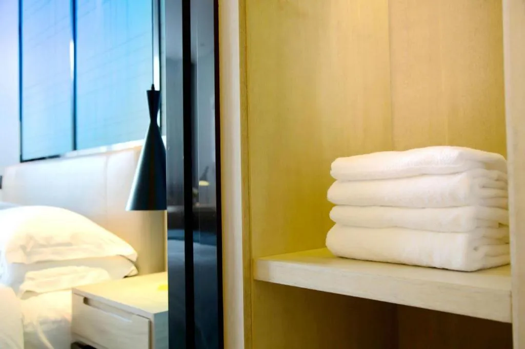 Bed in Echarm Hotel Kunming High-speed Railway South Station Chunrong Street Metro Station