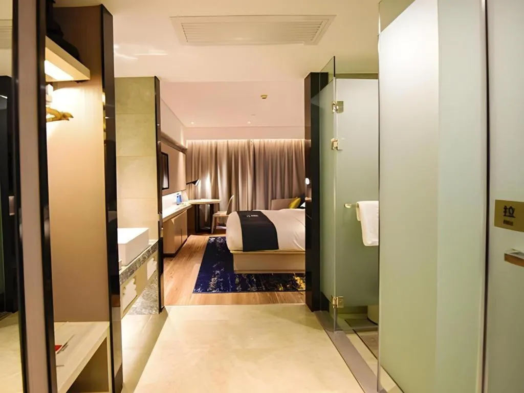 Bed in Echarm Hotel Kunming High-speed Railway South Station Chunrong Street Metro Station