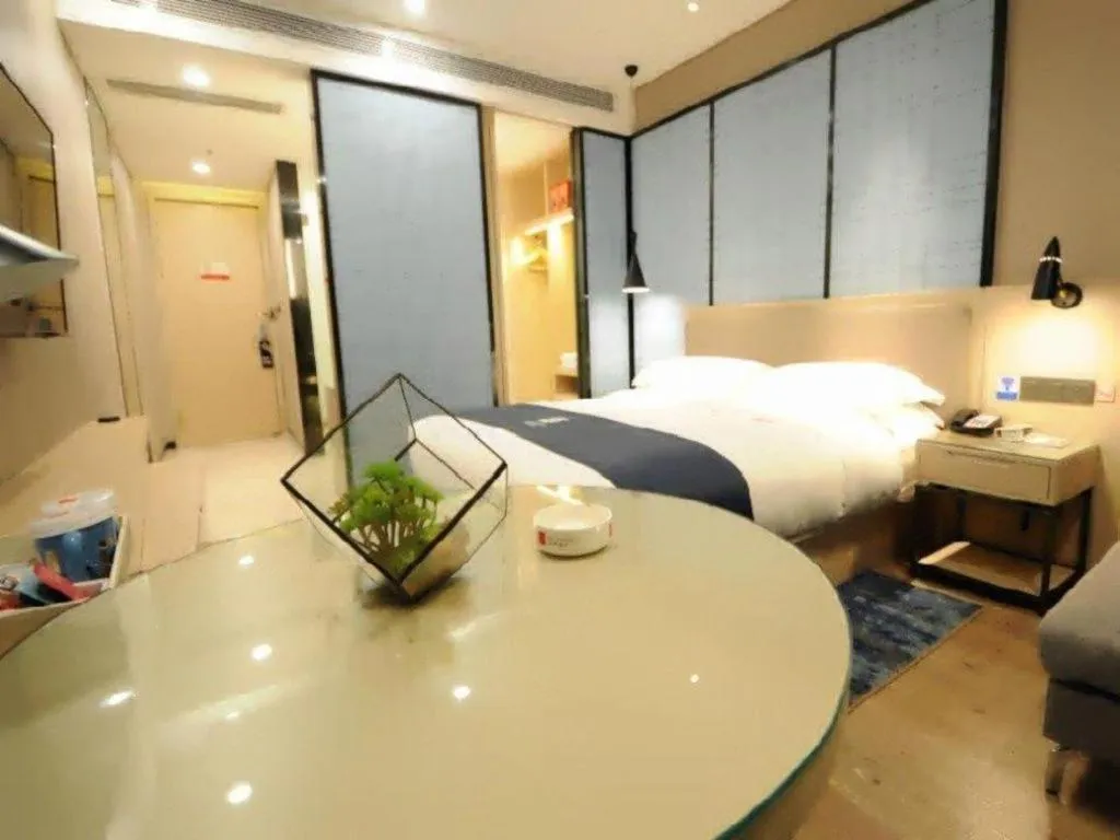 Bed in Echarm Hotel Kunming High-speed Railway South Station Chunrong Street Metro Station