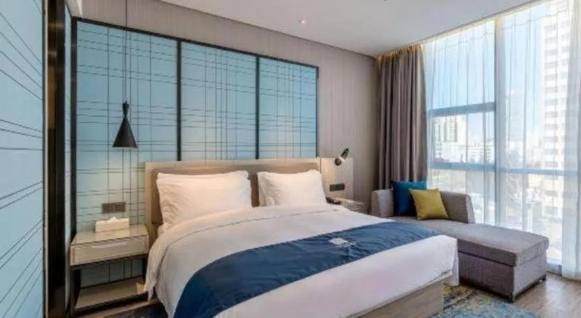 Bed in Echarm Hotel Kunming High-speed Railway South Station Chunrong Street Metro Station