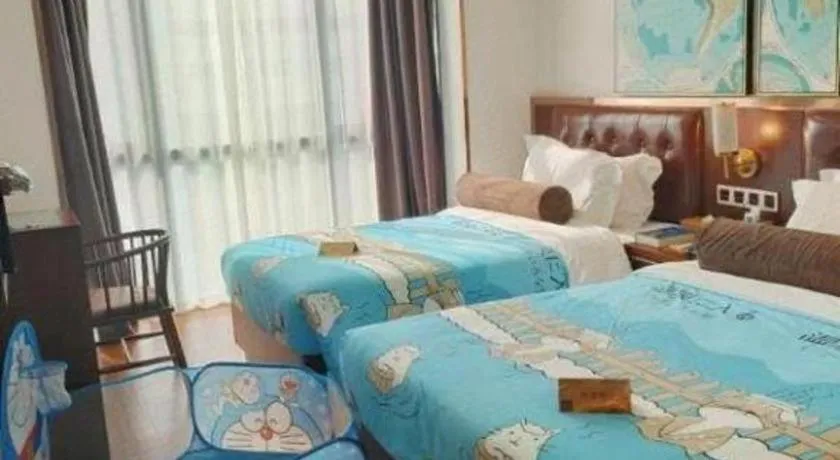 Bed in James Joyce Coffetel Guilin Railway Station Xiangbi Mountain Liangjiang Sihu Wharf