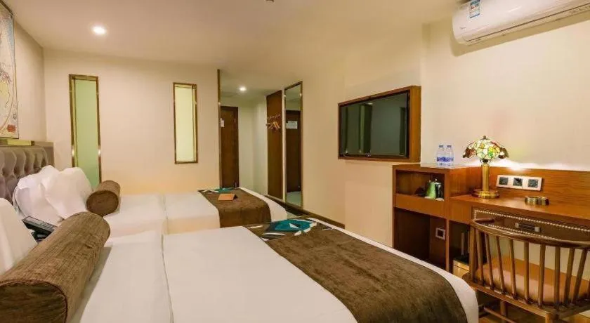 Bed in James Joyce Coffetel Guilin Railway Station Xiangbi Mountain Liangjiang Sihu Wharf