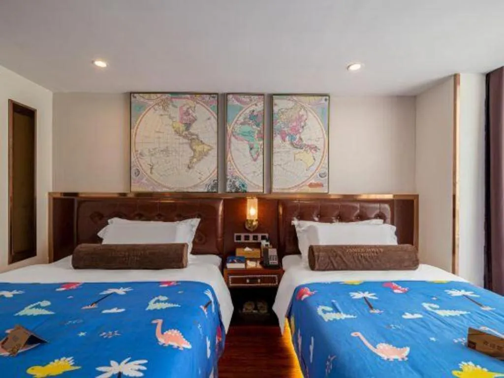 Bed in James Joyce Coffetel Guilin Railway Station Xiangbi Mountain Liangjiang Sihu Wharf
