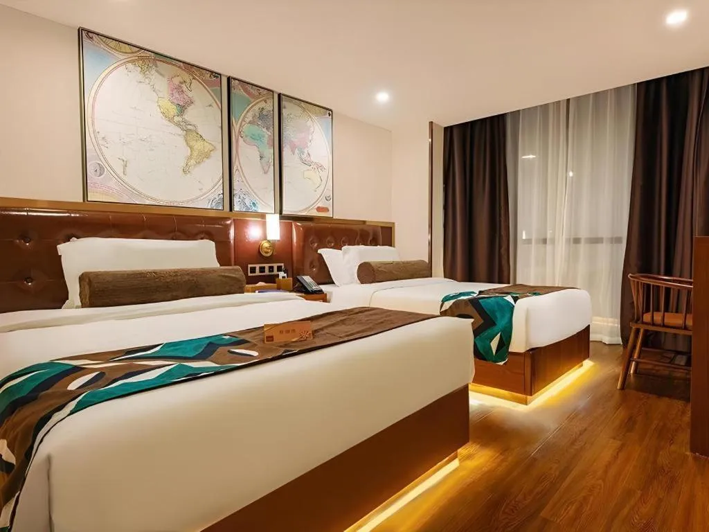 Bed in James Joyce Coffetel Guilin Railway Station Xiangbi Mountain Liangjiang Sihu Wharf