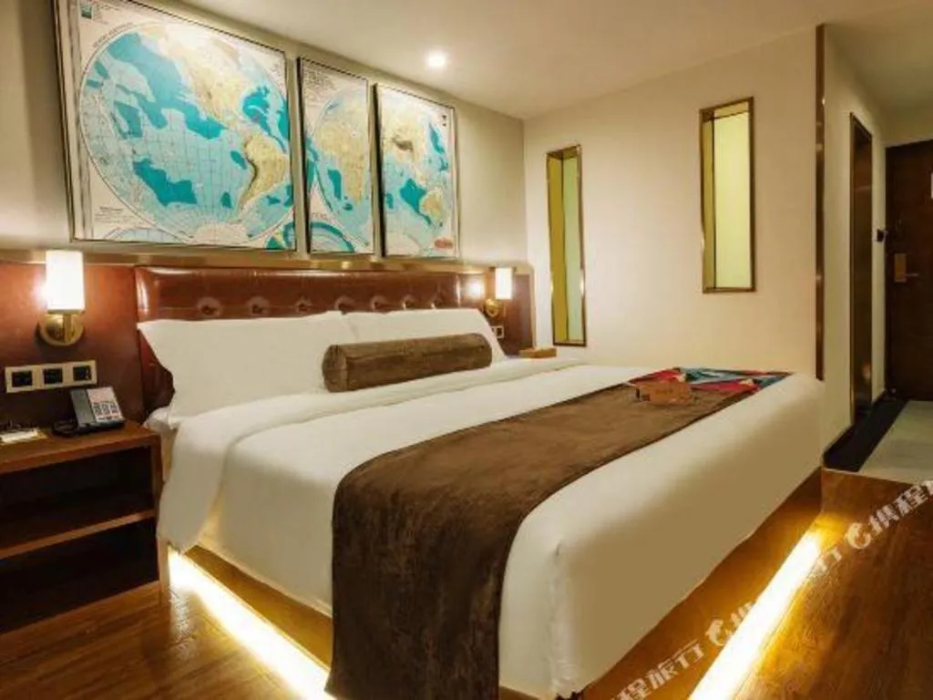 Bed in James Joyce Coffetel Guilin Railway Station Xiangbi Mountain Liangjiang Sihu Wharf