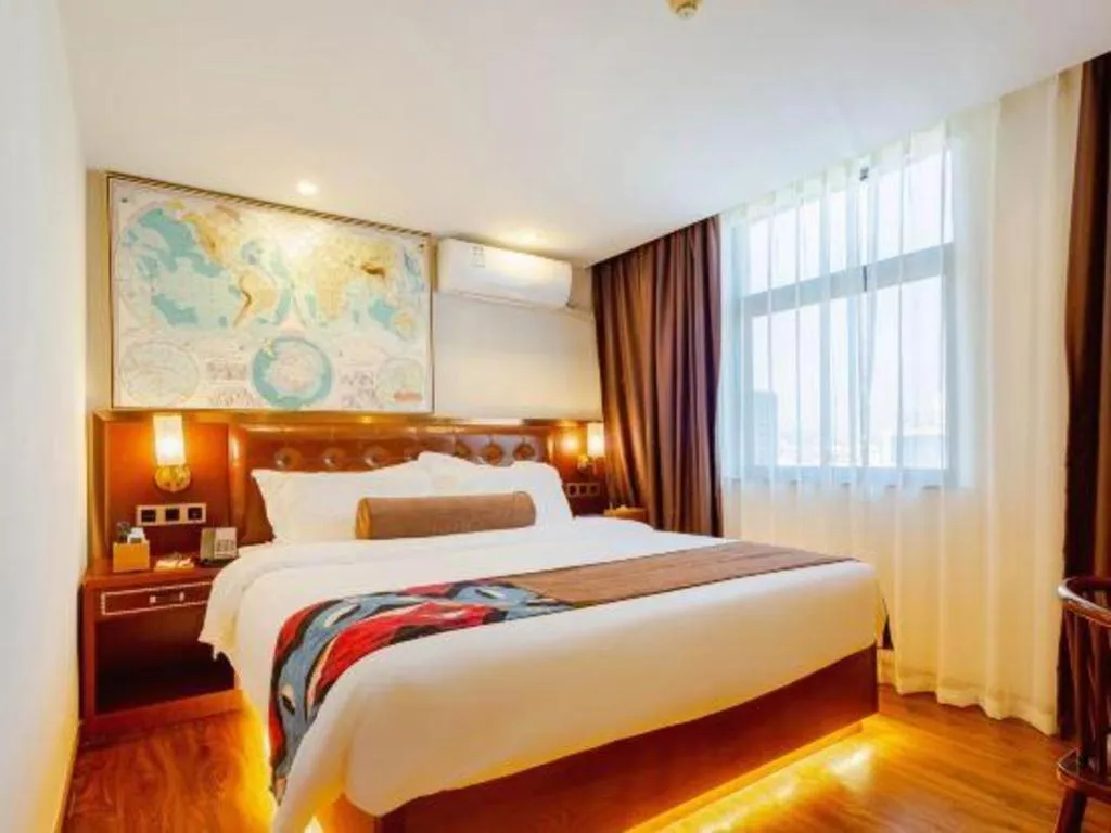 Bed in James Joyce Coffetel Guilin Railway Station Xiangbi Mountain Liangjiang Sihu Wharf
