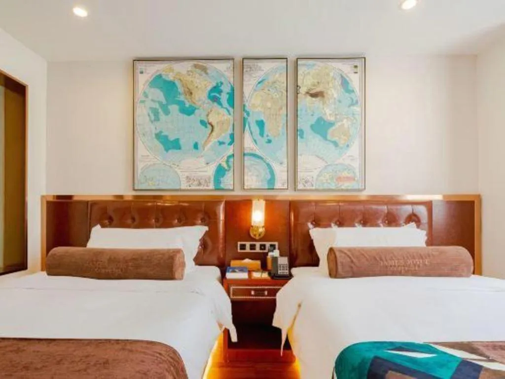 Bed in James Joyce Coffetel Guilin Railway Station Xiangbi Mountain Liangjiang Sihu Wharf