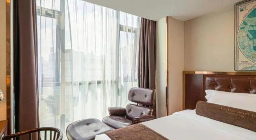 Bed in James Joyce Coffetel Guilin Railway Station Xiangbi Mountain Liangjiang Sihu Wharf