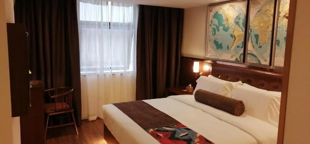 Bed in James Joyce Coffetel Guilin Railway Station Xiangbi Mountain Liangjiang Sihu Wharf