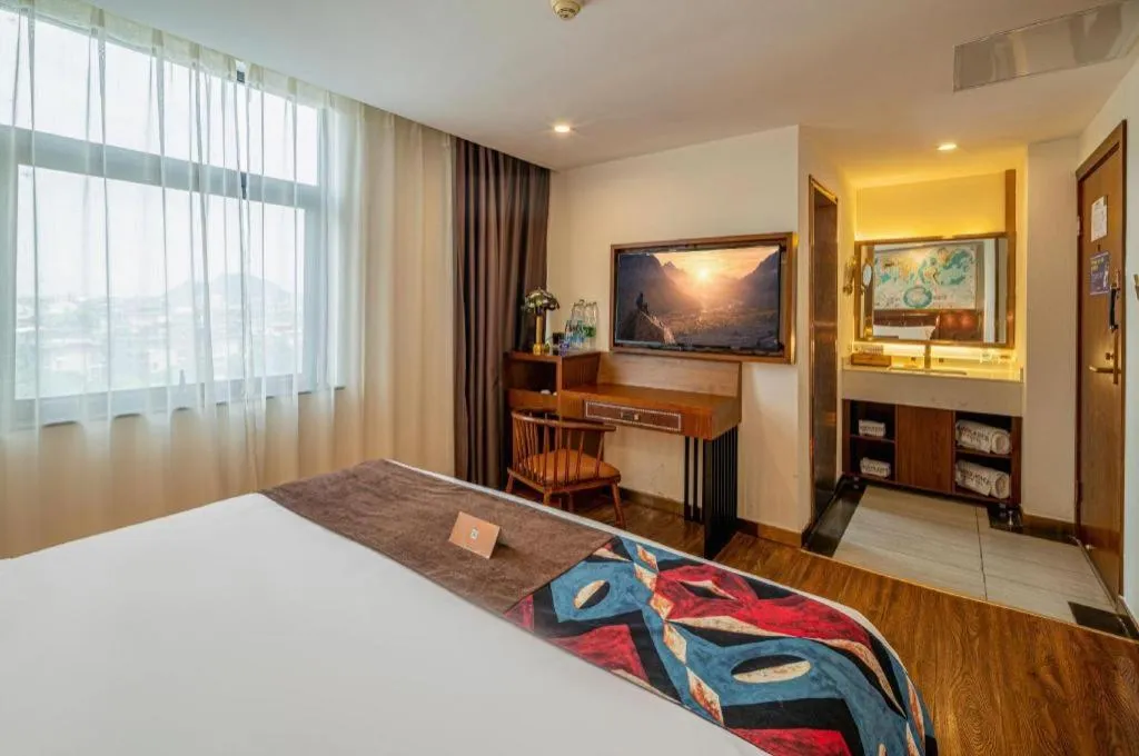 Bed in James Joyce Coffetel Guilin Railway Station Xiangbi Mountain Liangjiang Sihu Wharf