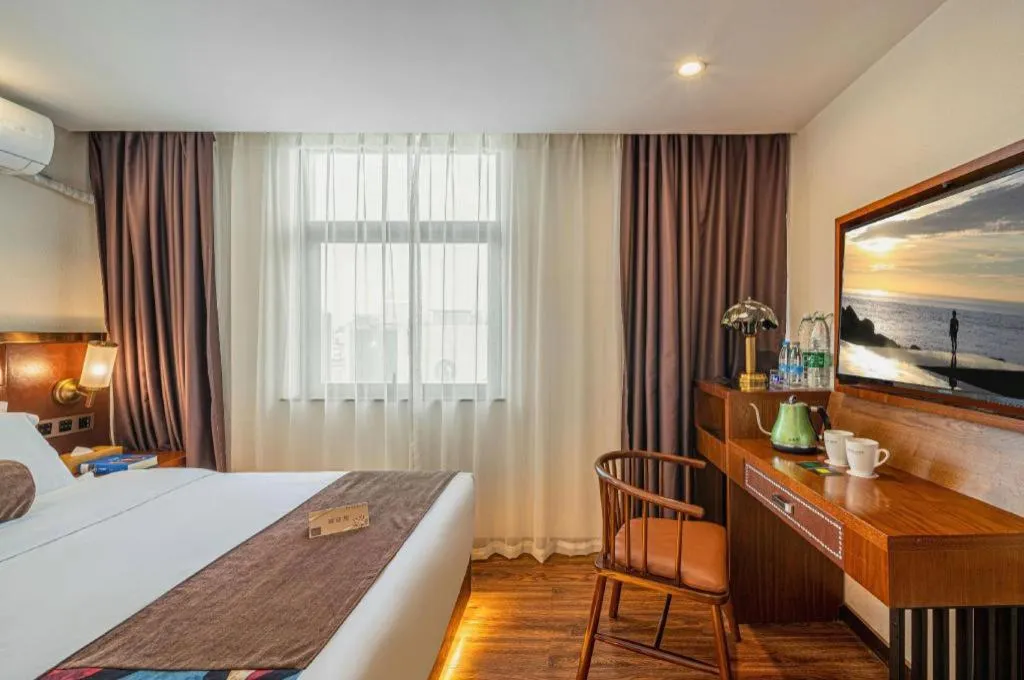 Bed in James Joyce Coffetel Guilin Railway Station Xiangbi Mountain Liangjiang Sihu Wharf