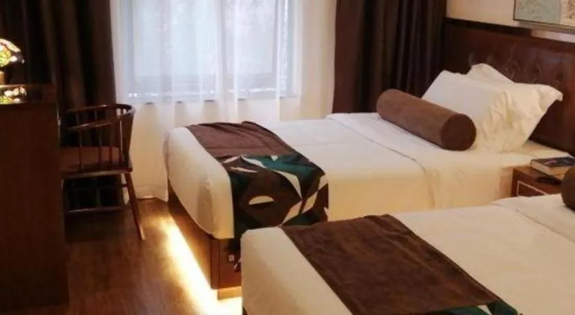 Bed in James Joyce Coffetel Guilin Railway Station Xiangbi Mountain Liangjiang Sihu Wharf