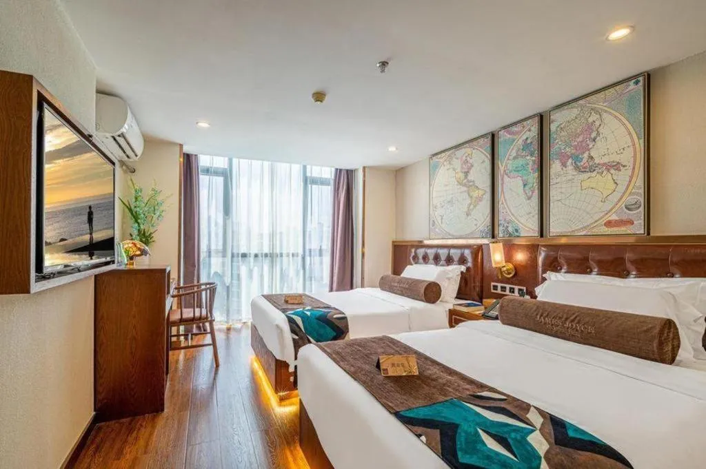 Bed in James Joyce Coffetel Guilin Railway Station Xiangbi Mountain Liangjiang Sihu Wharf
