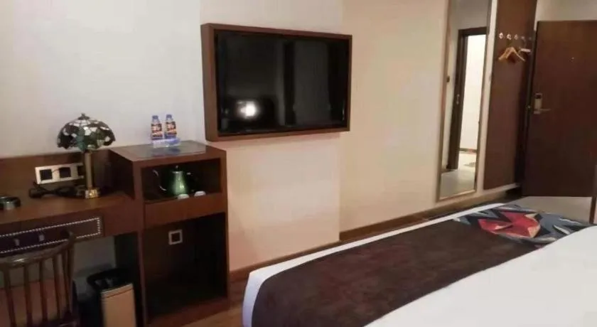Bed in James Joyce Coffetel Guilin Railway Station Xiangbi Mountain Liangjiang Sihu Wharf
