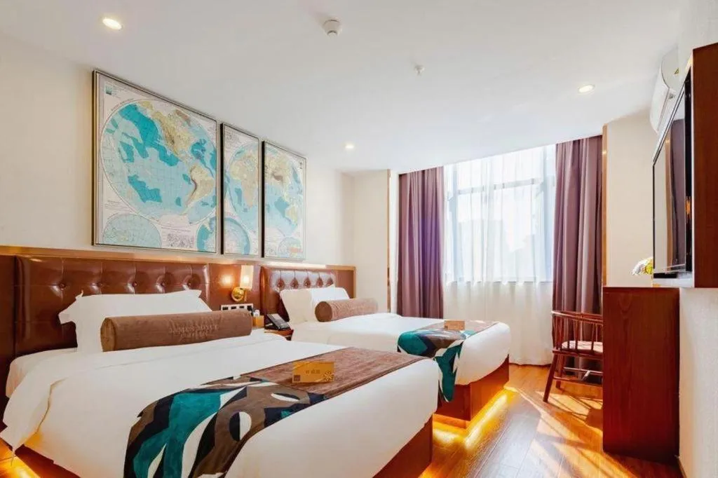 Bed in James Joyce Coffetel Guilin Railway Station Xiangbi Mountain Liangjiang Sihu Wharf