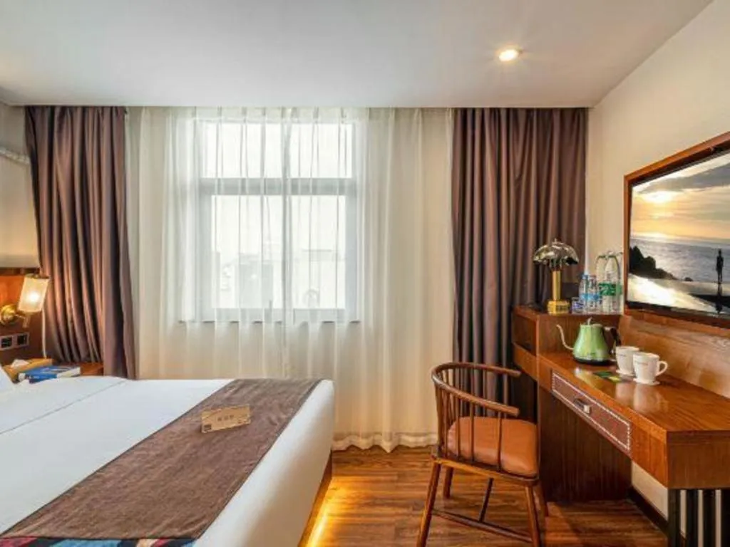 Bed in James Joyce Coffetel Guilin Railway Station Xiangbi Mountain Liangjiang Sihu Wharf