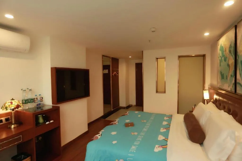 Bed in James Joyce Coffetel Guilin Railway Station Xiangbi Mountain Liangjiang Sihu Wharf