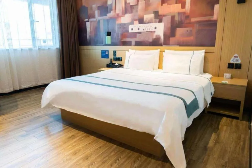 Bed in City Comfort Inn Foshan Sanshui Datang
