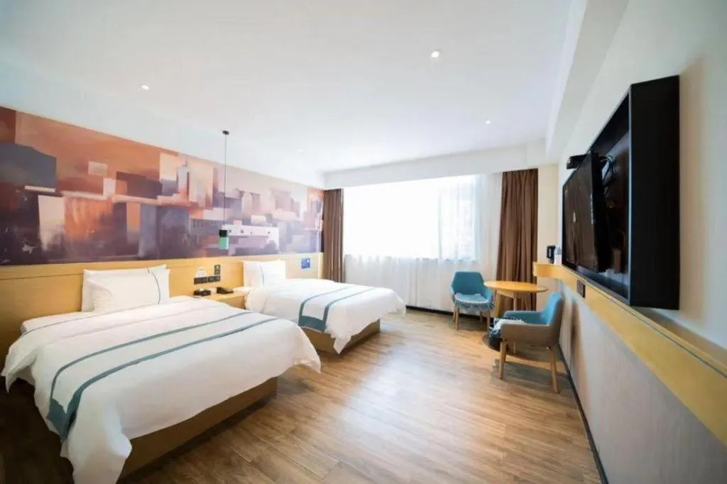 Bed in City Comfort Inn Foshan Sanshui Datang