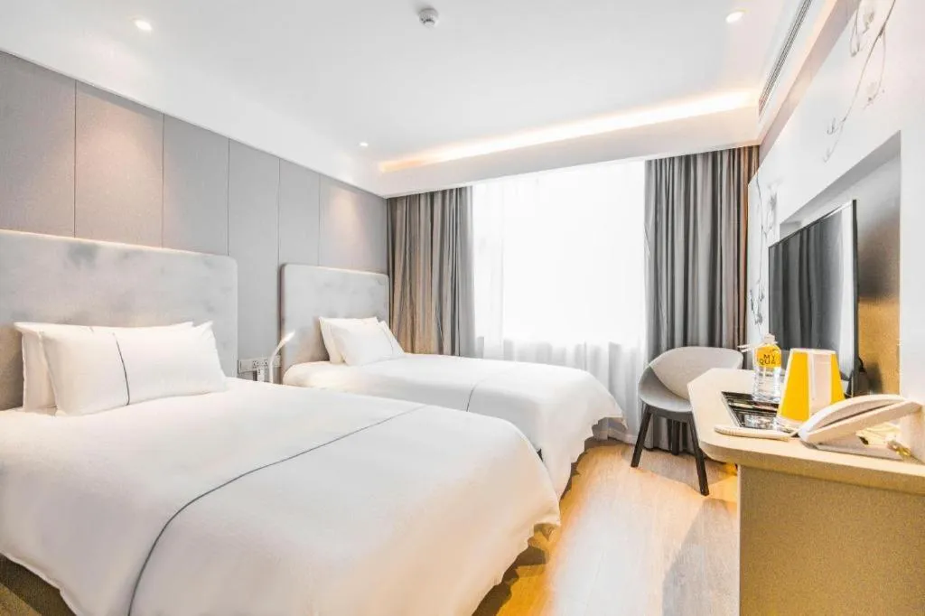 Bed in Magnotel Hotel Huangshan Scenic Area Transfer Center