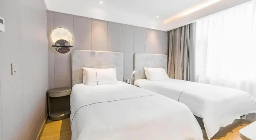 Bed in Magnotel Hotel Huangshan Scenic Area Transfer Center