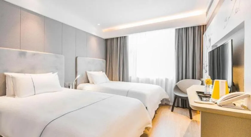 Bed in Magnotel Hotel Huangshan Scenic Area Transfer Center