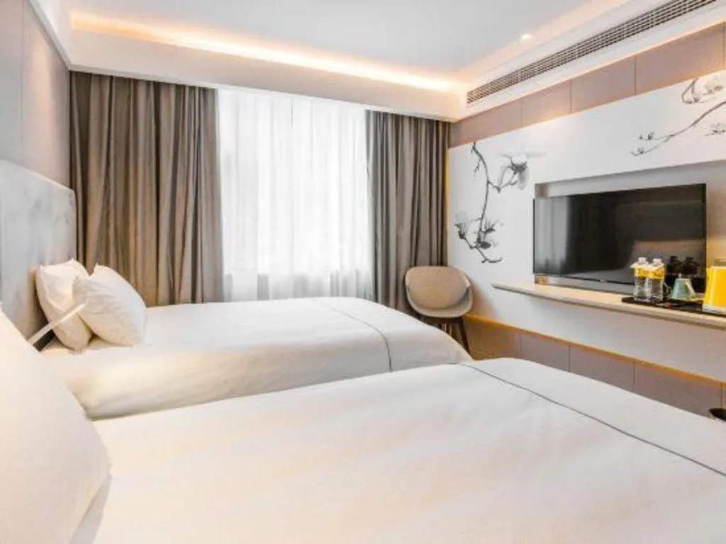 Bed in Magnotel Hotel Huangshan Scenic Area Transfer Center