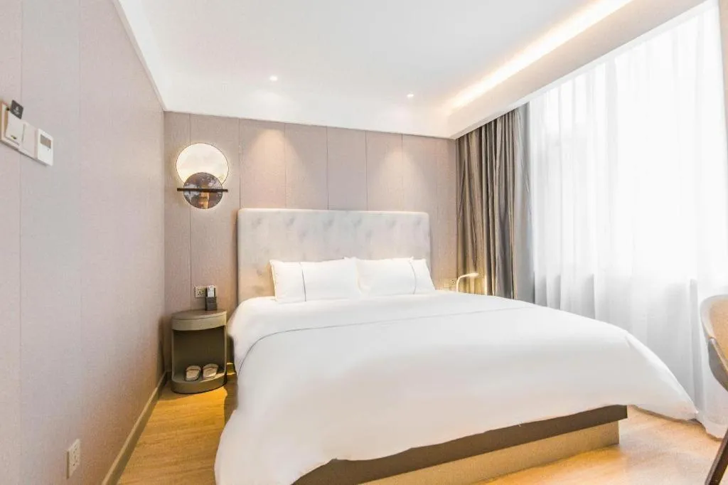 Bed in Magnotel Hotel Huangshan Scenic Area Transfer Center