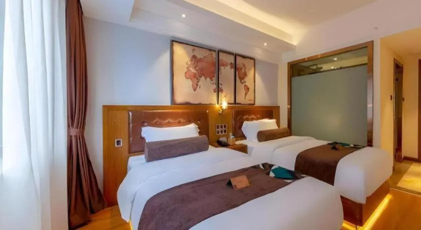 Bed in James Joyce Coffetel Kunming Railway Station Huancheng Nan Road Metro Station