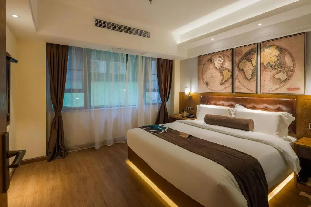 Bed in James Joyce Coffetel Kunming Railway Station Huancheng Nan Road Metro Station