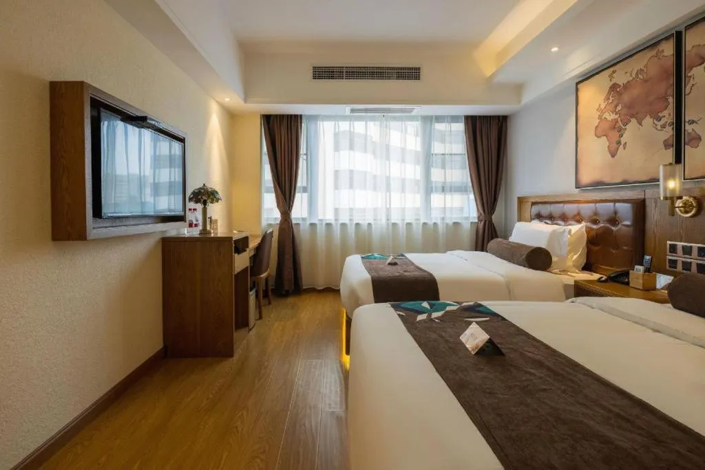 Bed in James Joyce Coffetel Kunming Railway Station Huancheng Nan Road Metro Station