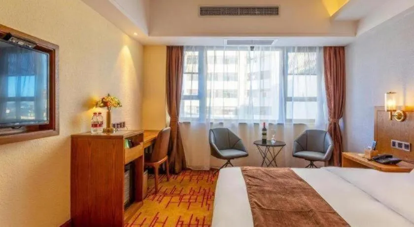 Bed in James Joyce Coffetel Kunming Railway Station Huancheng Nan Road Metro Station