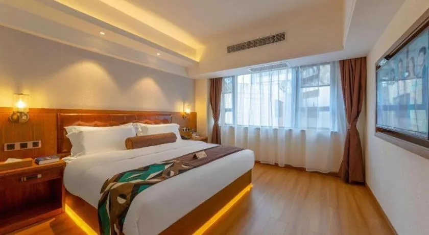 Bed in James Joyce Coffetel Kunming Railway Station Huancheng Nan Road Metro Station