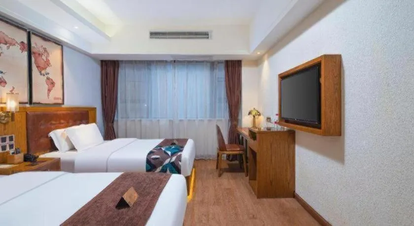 Bed in James Joyce Coffetel Kunming Railway Station Huancheng Nan Road Metro Station