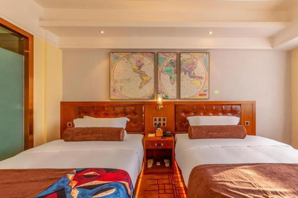 Bed in James Joyce Coffetel Kunming Railway Station Huancheng Nan Road Metro Station