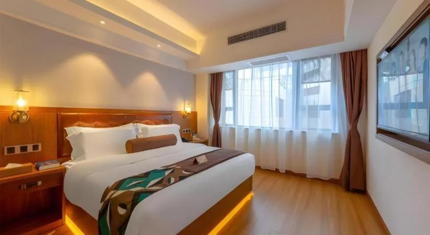 Bed in James Joyce Coffetel Kunming Railway Station Huancheng Nan Road Metro Station