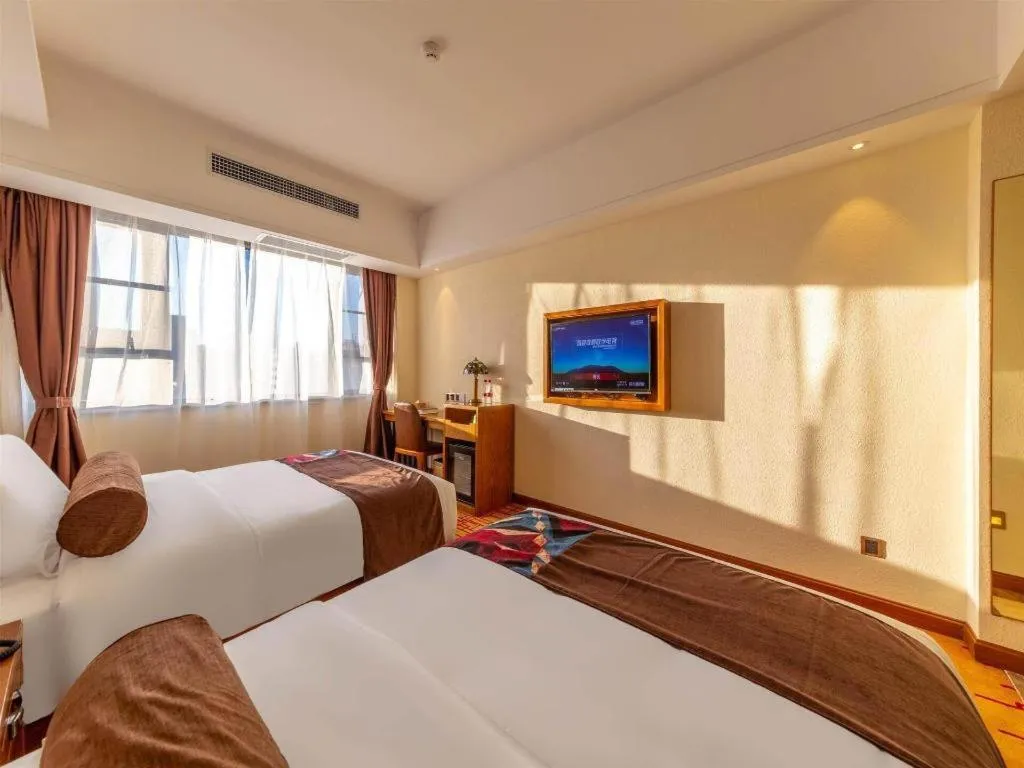 Bed in James Joyce Coffetel Kunming Railway Station Huancheng Nan Road Metro Station