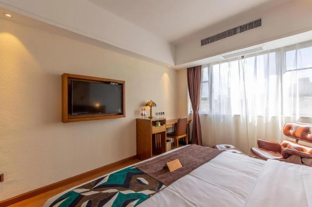 Bed in James Joyce Coffetel Kunming Railway Station Huancheng Nan Road Metro Station