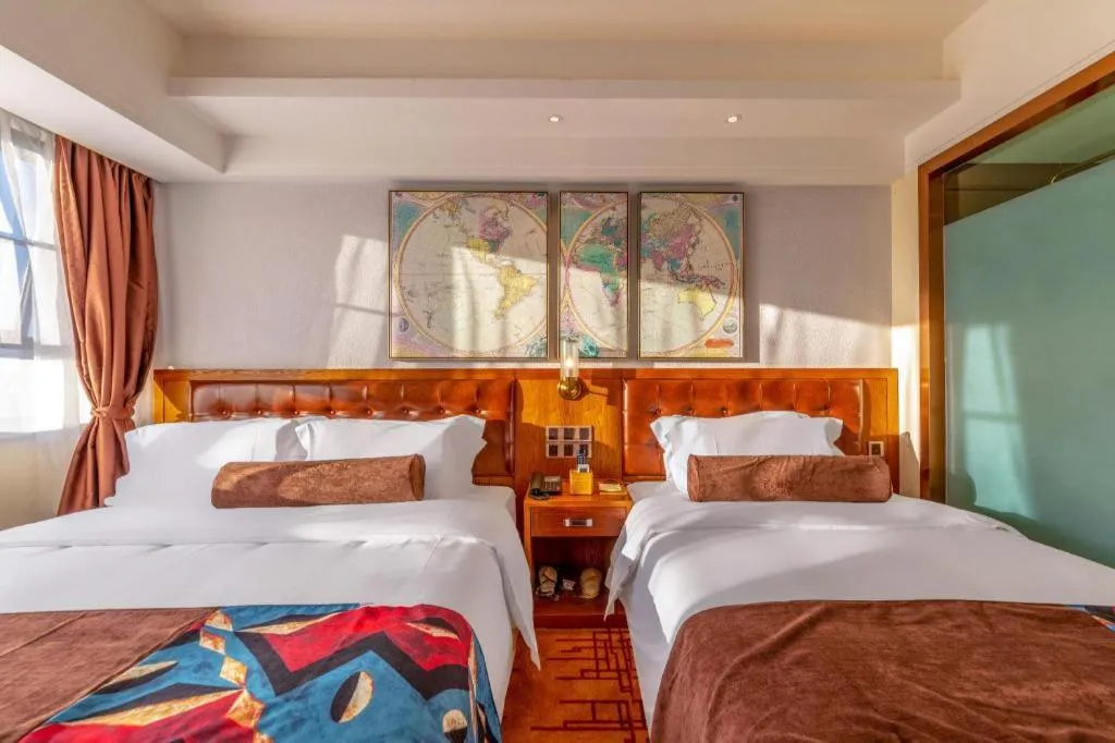 Bed in James Joyce Coffetel Kunming Railway Station Huancheng Nan Road Metro Station