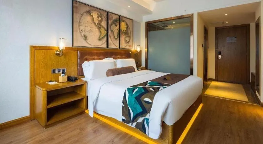 Bed in James Joyce Coffetel Kunming Railway Station Huancheng Nan Road Metro Station