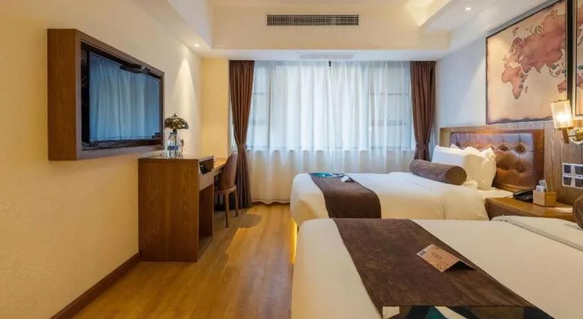 Bed in James Joyce Coffetel Kunming Railway Station Huancheng Nan Road Metro Station