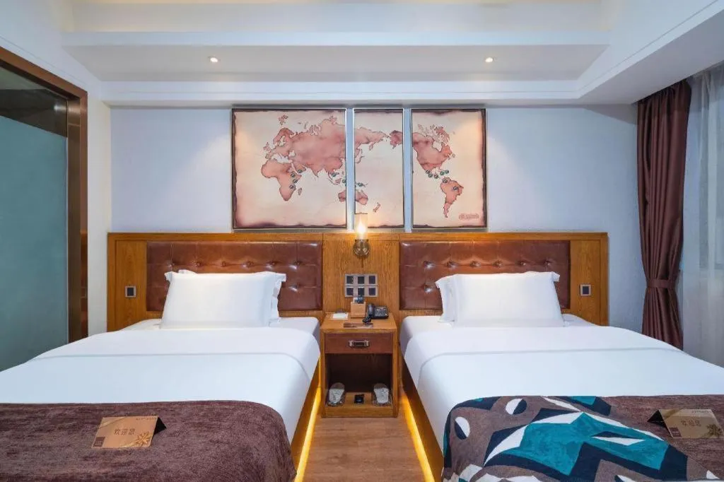 Bed in James Joyce Coffetel Kunming Railway Station Huancheng Nan Road Metro Station