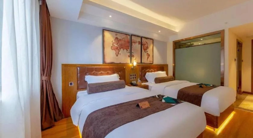 Bed in James Joyce Coffetel Kunming Railway Station Huancheng Nan Road Metro Station