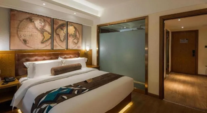 Bed in James Joyce Coffetel Kunming Railway Station Huancheng Nan Road Metro Station